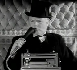 W.C. Fields speaking in a dictaphone mic.