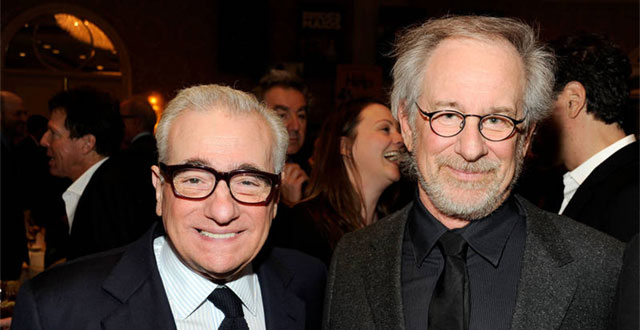 Candid photo at gathering with Martin Scorsese and Steven Spielberg posing together.